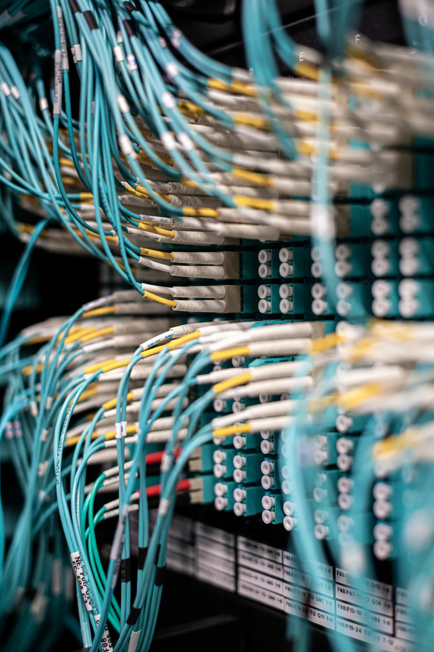 Fiber-optic connections on a patch panel.
